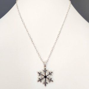 Silver snowflake with black and gray crystals pendant necklace